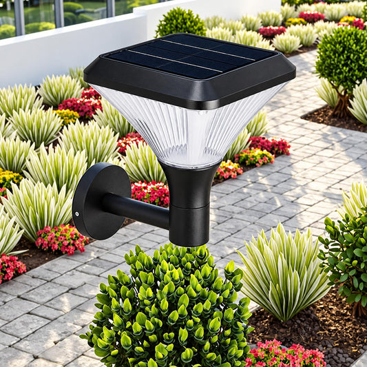 Solar garden wall light next to a paved path